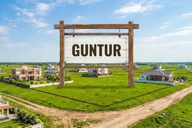 Residential plots for sale in Guntur city with wide roads and green landscaping
